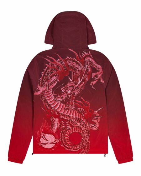 TRAPSTAR X ED HARDY WINDBREAKER – RED Vibrant red shell with signature Trapstar x Ed Hardy graphics Durable wind and water-resistant fabric Adjustable hood and cuffs for a custom fit Front zip closure and secure pockets Limited edition — own a piece of urban art.