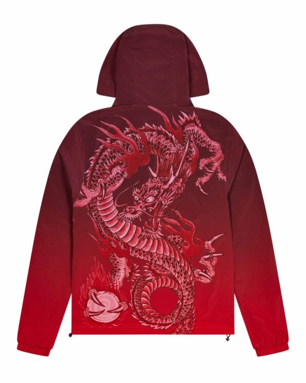 TRAPSTAR X ED HARDY WINDBREAKER – RED Vibrant red shell with signature Trapstar x Ed Hardy graphics Durable wind and water-resistant fabric Adjustable hood and cuffs for a custom fit Front zip closure and secure pockets Limited edition — own a piece of urban art.